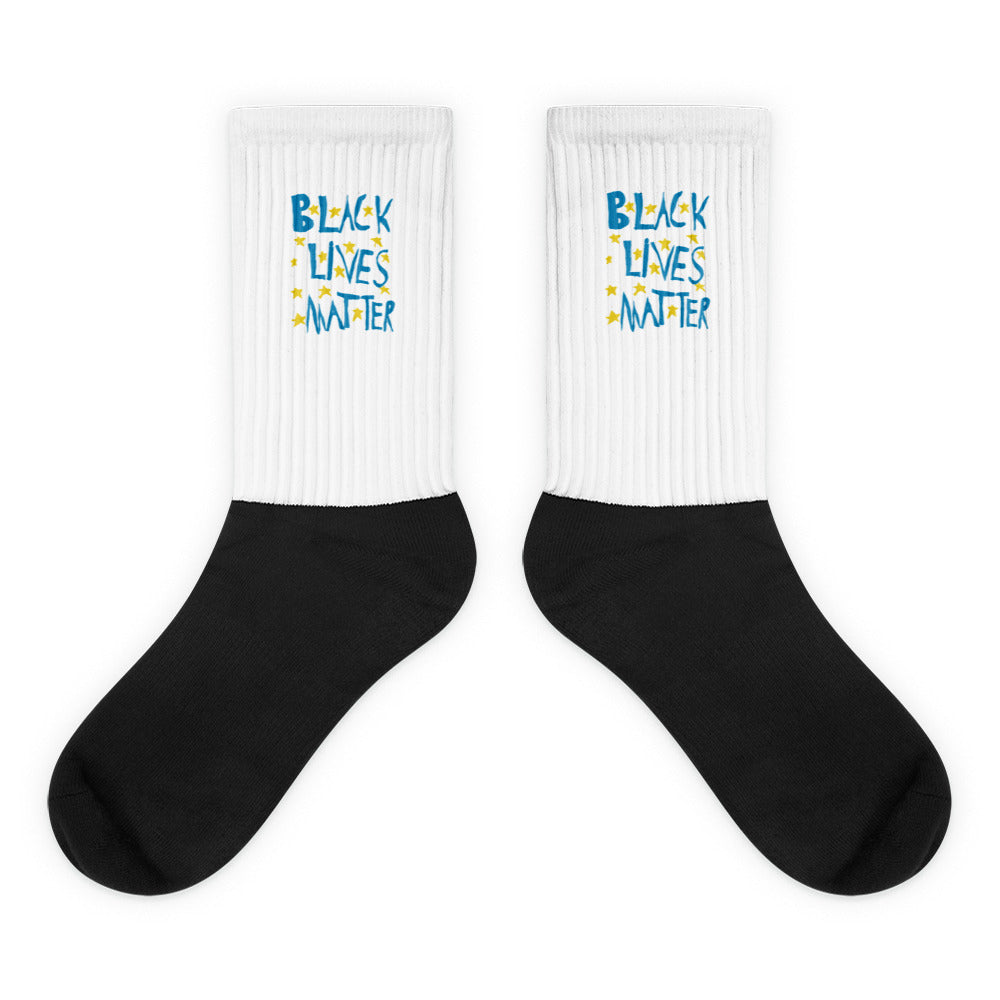 Black Lives Matter cool socks with a change makers hand drawn design by our young entrepreneur
